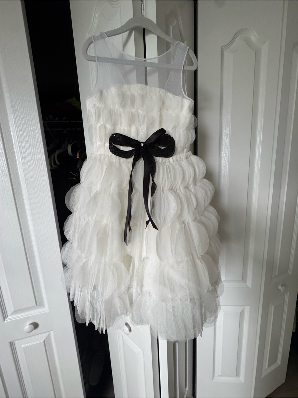 Choupette White Ruffled Tulle Girls' Dress with Black Bow.